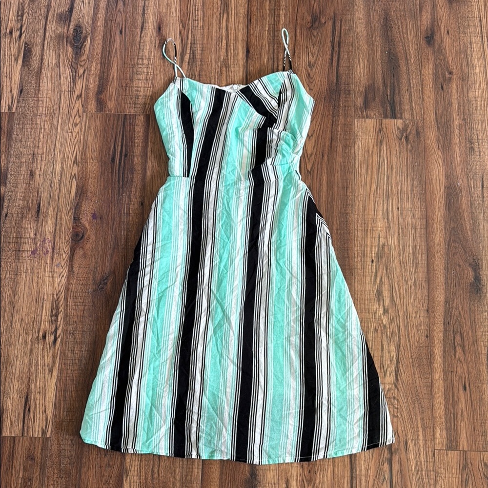 Women’s size 4 Striped Mint and Black Dress lightly used.